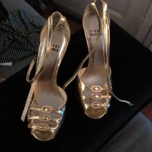 Stuart Weitzman gold shoes with ankle cross cross strap